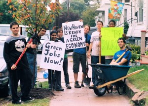 Green Jobs Corps students do environmental work around the city. Here they hold signs supporting green job opportunities. 