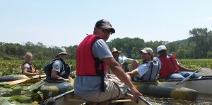 LEAF interns do water preservation and study work from canoes.