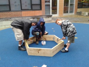 m and j at columbus building a hex bed