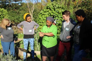 Ms. Wilson teaching in the garden