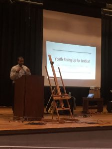 Nate Wilson speaking at the Earth Day Youth Summit at Hillhouse High School.