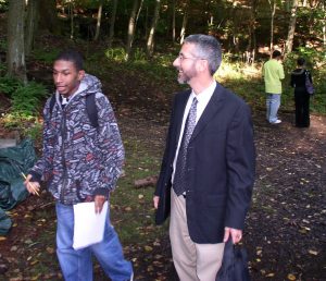 While still a student at Common Ground, Tyler talks with SCSU professor Andrew Smyth as part of college exploration program.