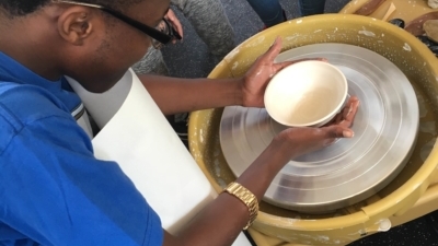 Student in ceramics class
