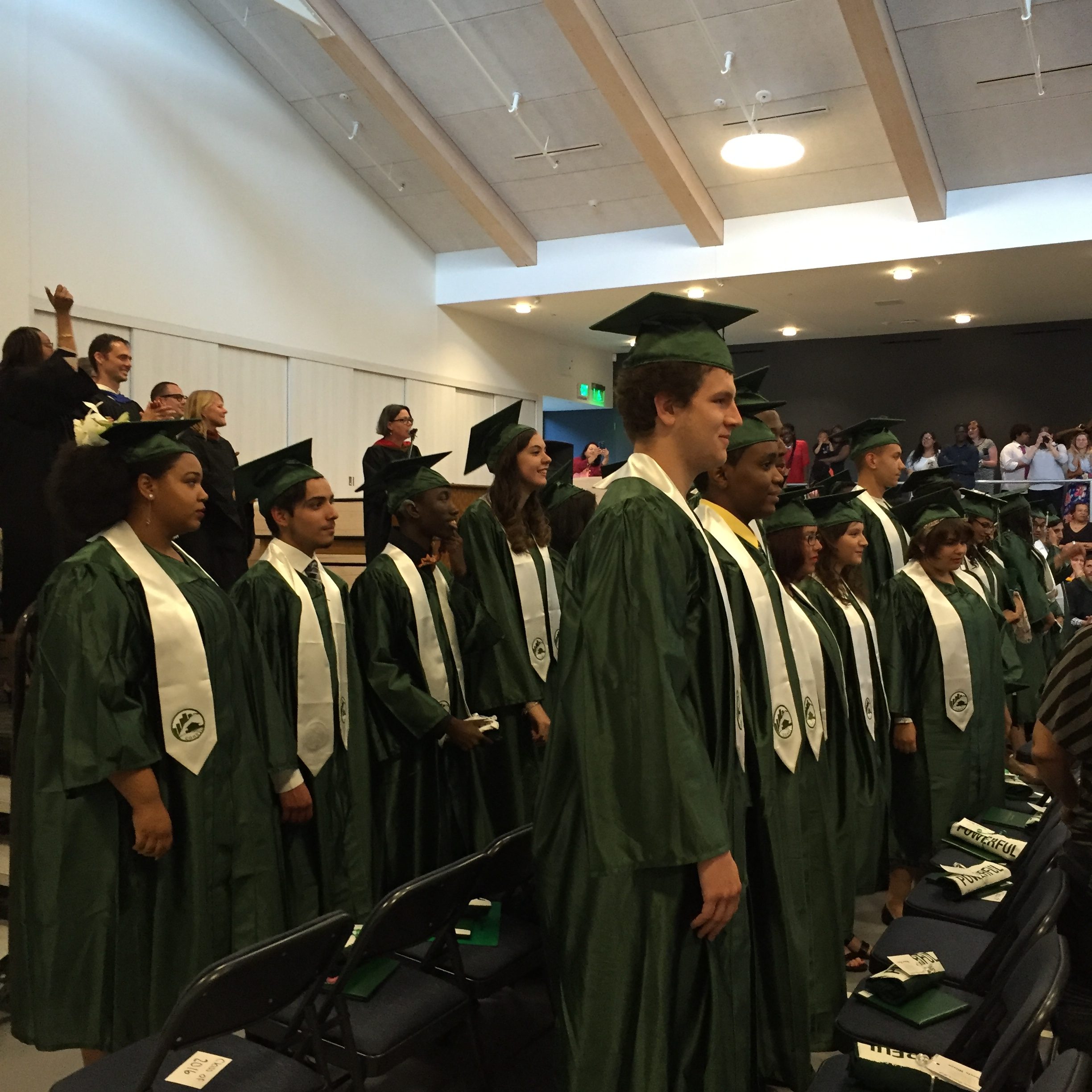 Students in caps and gowns at Common Ground's 2016 graduation.